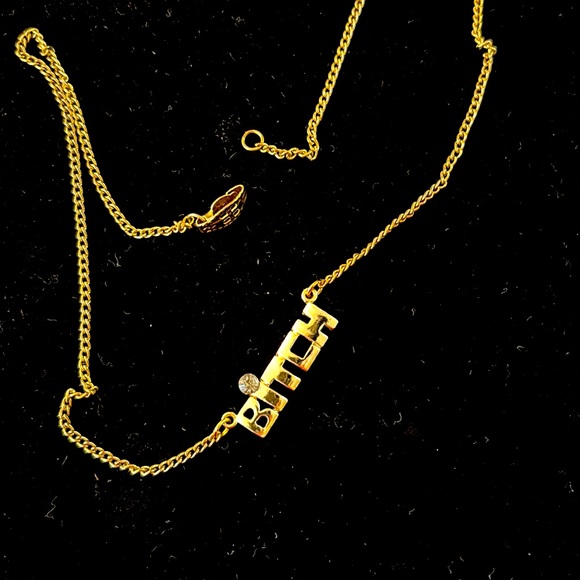 A gold toned and rhinestone necklace - Picture 4 of 7